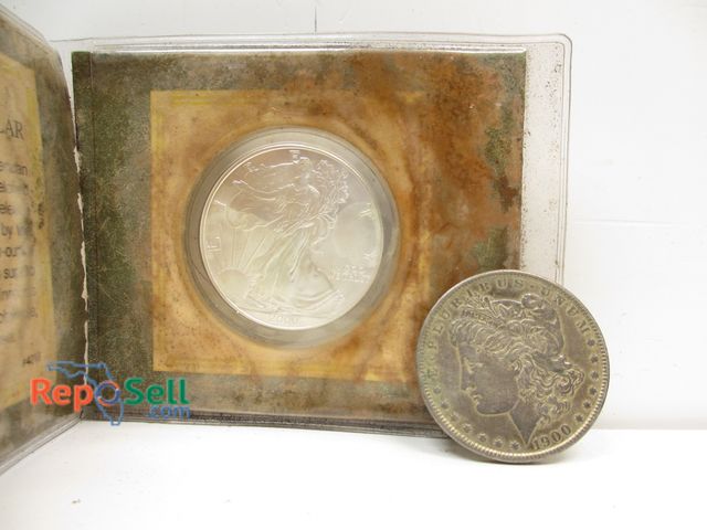 Lot 31-2021 - 2000 1oz Silver American Eagle Liberty Dollar and 1900 Morgan Silver Dollar