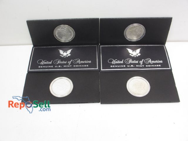 Lot 31-7002 - (4) US Mint Morgan Silver Dollars with Covers: 1883, 1885, 1897, 1921