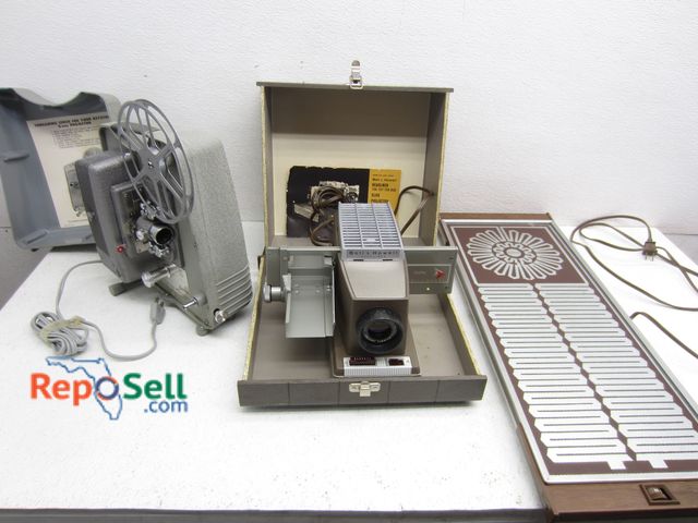 Lot 31-6205 - Vintage Estate Lot: 8mm Projector, Slide Projector And Food Warmer - All Power On