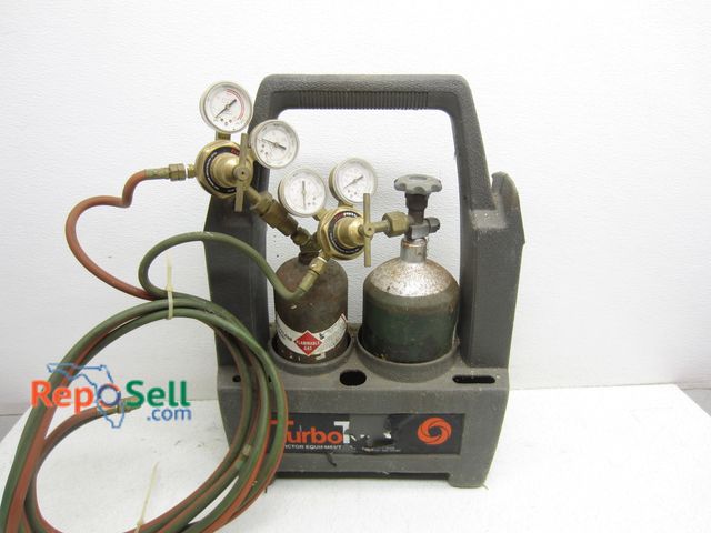 Lot 31-6433 - Welding System With (2) Tanks, Hose And Gauges etc