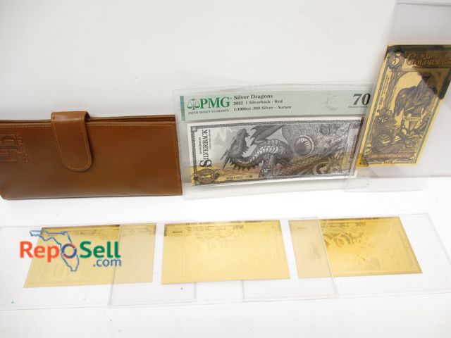 Lot 31-3028 - (4) Wyoming Gold Bucks with Wallet and Silver Dragon