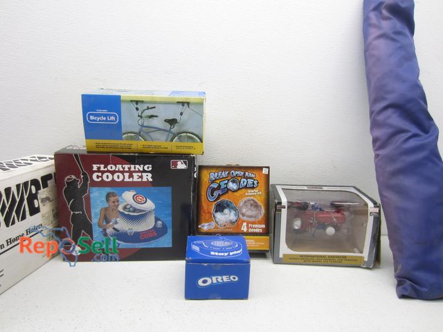 Lot 31-9340 - Estate Lot: International Harvester, Floating Cooler, Geode Kit, etc.