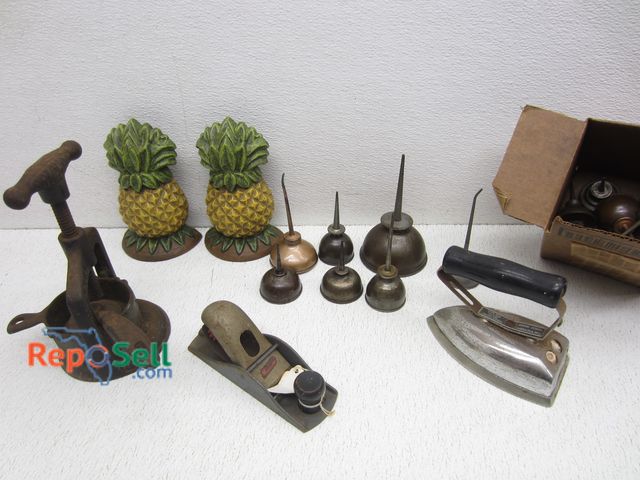Lot 31-6362 - Vintage Collectibles: Oil Cans, Meat Press, Wood Plane, etc.