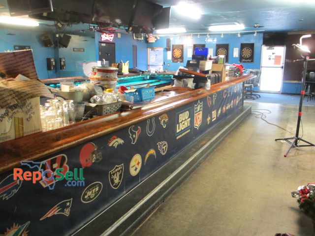 Lot 31-2168 - Entire Wood Bar Top Only or Portions Of - Buyer Must Disassemble and Remove - Approx 25'L x 10'W
