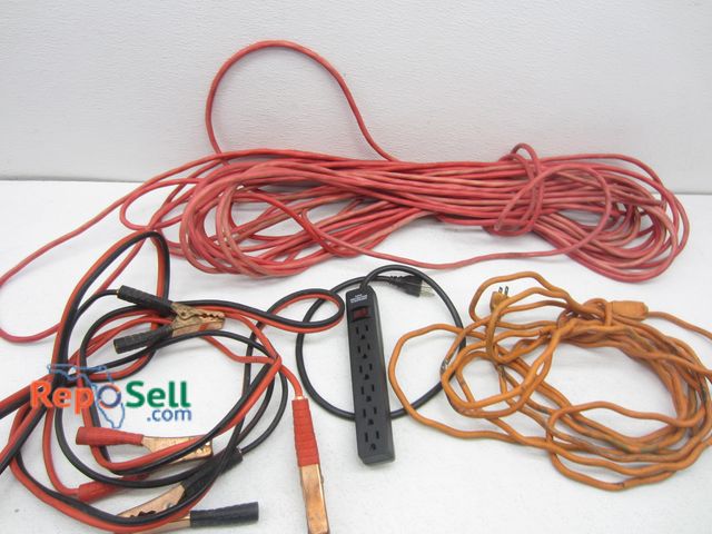 Lot 31-5584 - (2) Extension Cords (1 - Red 100' 2 Male Ends), Jumper Cables, Power Strip
