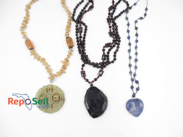 Lot 31-9031 - (3) Carved Stone Necklaces: Lapis, Jade, Crystal