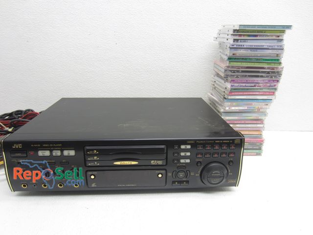 Lot 31-9344 - JVC 3 Disc CD Player XL (missing cord) with Approx (30) CD's - Powers On