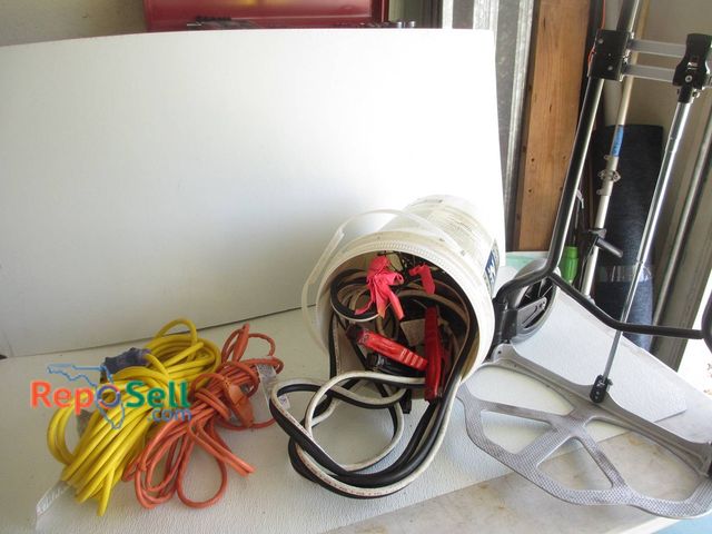 Lot 31-8585 - Extension Cords, Jumper Cables In Bucket, And Folding Hand Truck