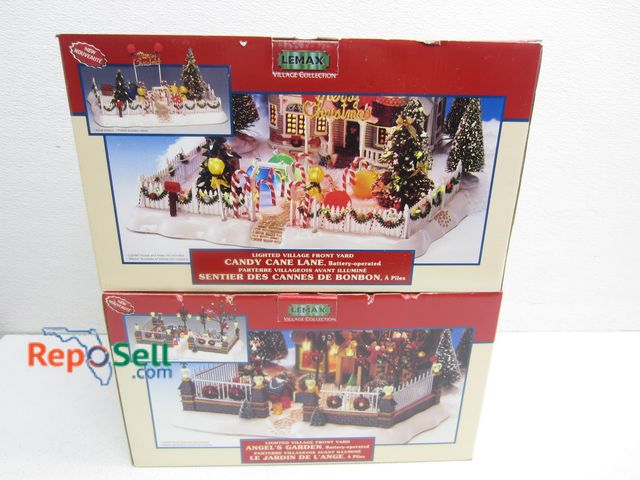 Lot 31-3564 - (2) Lemax Christmas Villages: Candy Cane Lane (Power On) And Angels Garden