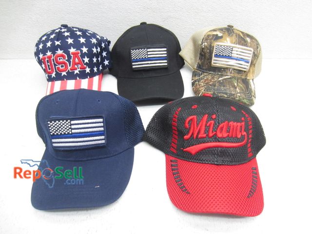 Lot 31-9253 - (8) new hats with tags, (4) with removable badges.