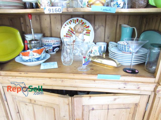 Lot 31-9161 - Ceramic tableware and glassware including plates, bowls, cups, and pitchers. Items including 'Made I...