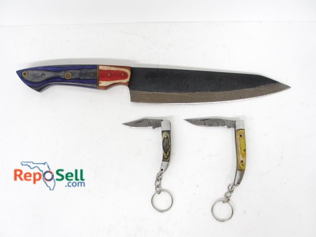 Lot 31-7080 - (2) Pocket knives and (1) kitchen knife.