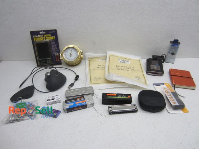 Lot 31-9396 - Electronics/Estate Lot: Harmonica, Barometer, Bose Speaker (no cord), Radar Detector (untested), etc...