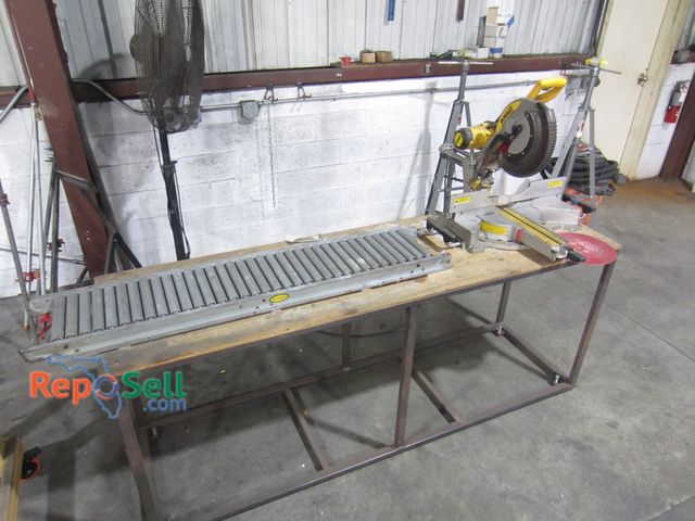 Lot 31-8016 - Dewalt 12" Chop Saw with Stand &amp; Conveyor &amp; Self Leveling Feet - Powers On - 92" Total Lengt...