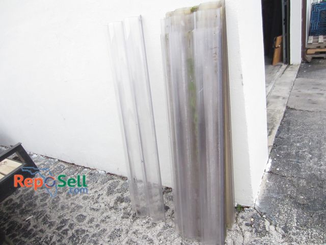 Lot 31-9266 - (22) Polycarbonate Storm Shutters 55" to 62" - (9) are 59"