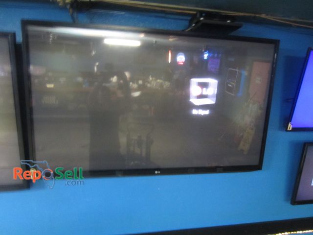 Lot 31-2017 - 60" LG TV - Powers On - BUYER MUST REMOVE/BRING LADDER/TOOLS