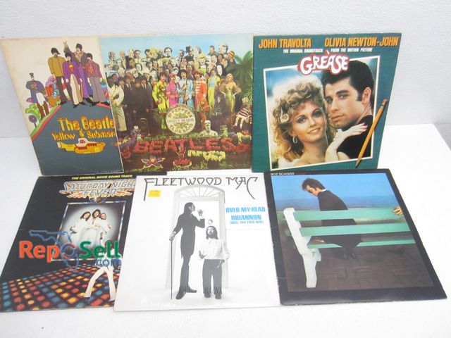 Lot 31-9317 - (6) Vintage Vinyl Records: Beatles Yellow Submarine And Lonely Hearts, Travolta Grease etc