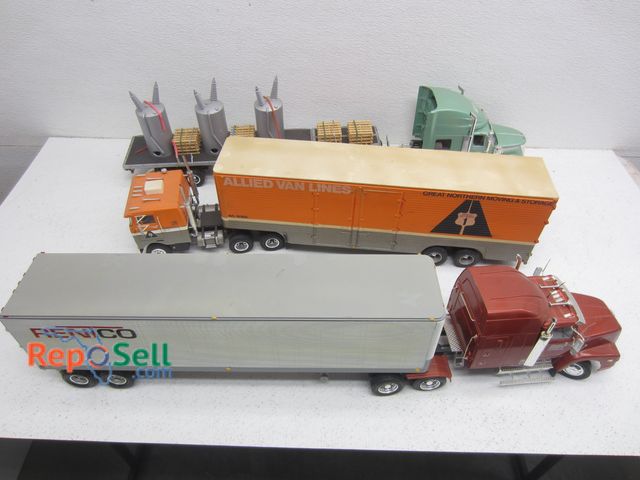 Lot 31-9234 - (3) Assorted Truck Cabs and Trailers 1:24 Scale