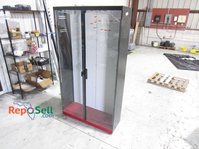 Lot 31-8052 - Clear Storage Cabinet with pegboard rear wall.  Has LED lights (untested) No key 74" H x 14" D x  40...