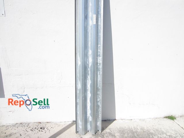 Lot 31-6133 - (14) Galvanized Steel Storm Shutters 105.5" L