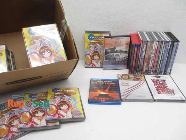 Lot 31-3215 - (31) DVD's and (20) Cardcaptors
