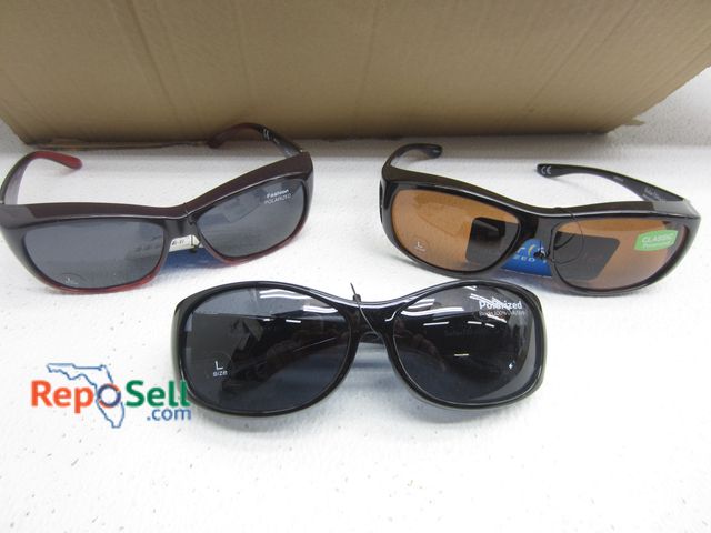 Lot 31-9112 - (25) Foster Grant Solar Shield Polarized Sunglasses - Fit Over Regular Sunglasses
