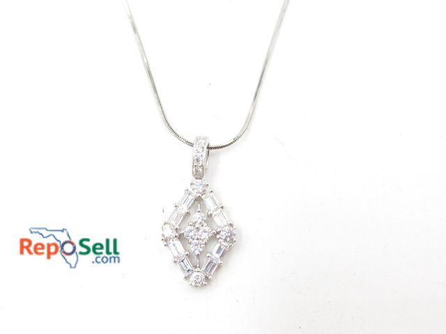 Lot 31-5007 - 18K White Gold Diamond Pendant (2.4g total) and 10K 14" Chain (2.1g total)