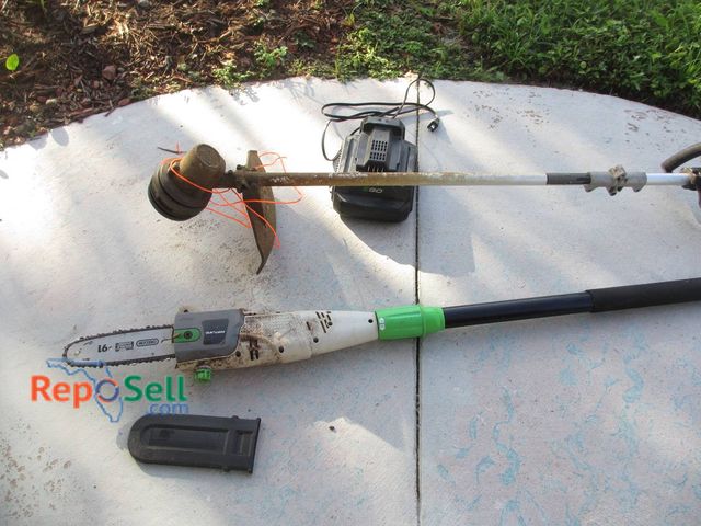 Lot 31-8576 - EGO 56V Lithium Battery Trimmer and Portland Pole Saw with (1) Battery & Charger