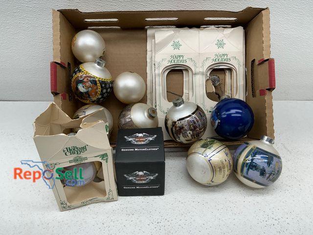 Lot 31-1412 - Holiday ornaments featuring various themes. Includes Harley-Davidson branded ornaments in original b...