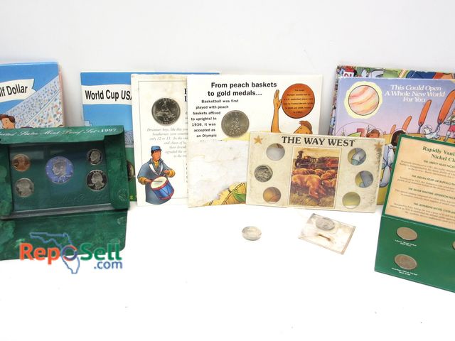 Lot 31-2023 - Coin Collection: 1997 Mint PR Set, Vintage Nickels, World Cup Coins (water damage/some stuck togethe...