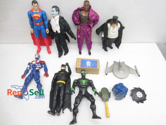 Lot 31-9358 - (7) Action Figures With Acces: Batman, MC Hammer, Penguin etc