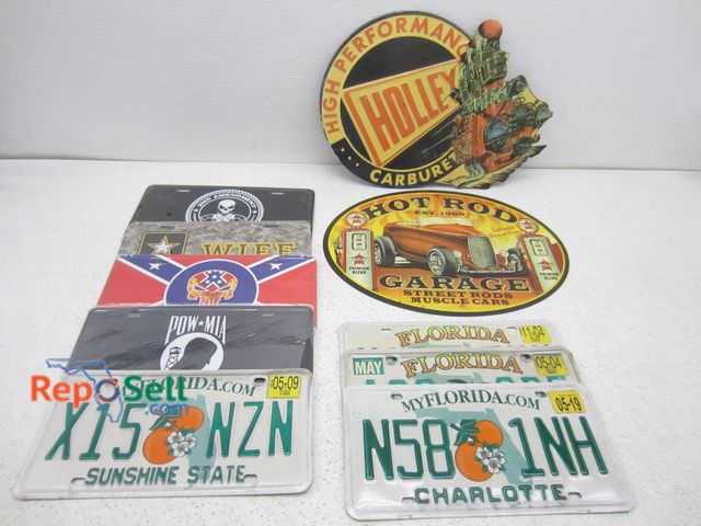 Lot 31-9440 - (4) License plates and (6) signs.