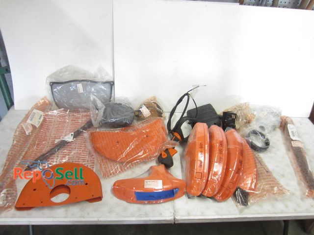 Lot 31-1242 - A Variety Of Stihl Replacement Parts And Accessories Such As Covers, Spray Lance, Deflector, And Oth...