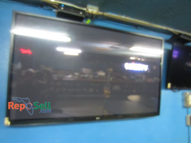Lot 31-2014 - 60" LG TV - Powers On - BUYER MUST REMOVE/BRING LADDER/TOOLS