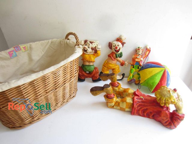 Lot 31-9193 - Homco-painted clown figurines in vibrant colors, with distinct poses and designs. Pieces feature a r...