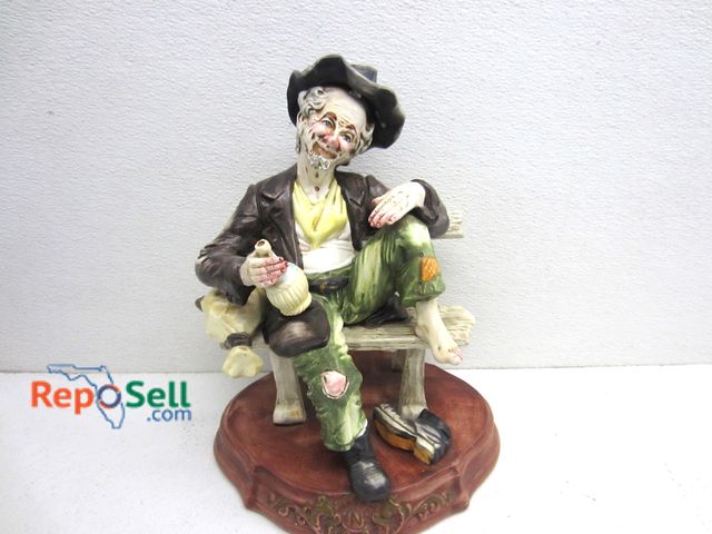 Lot 31-5406 - Capodimonte Porcelain Figure Hobo On a Bench Made in Italy, 13.5" High