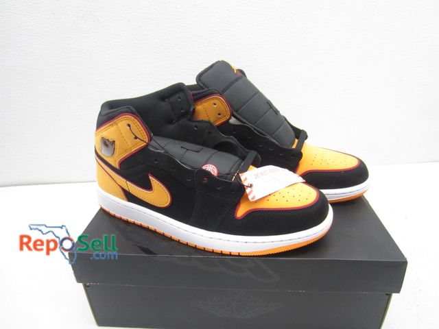 Lot 31-5295 - Air Jordans 9.5M Vivid Orange New Shoes with Box