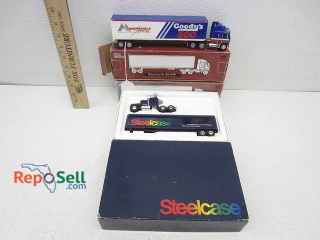Lot 31-4187 - (3) Die Cast Metal Trucks: Goody's, Kenworth And Steelcase
