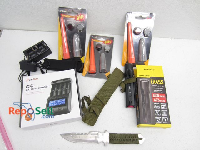 Lot 31-6061 - Nitecore EA45S Flashlight, Survival knife, C4 battery charger, Fenix accessory pack