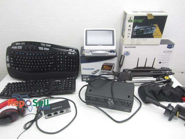 Lot 31-1245 - Electronics Lot: APC Surge Protector, DVD Player, CB Radio, etc.
