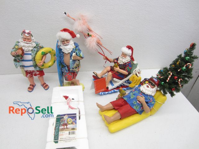 Lot 31-9419 - (4) Tropical Clothtique Santas
