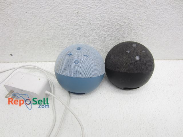 Lot 31-8164 - (2) Small Wireless Speakers With (1) Charger - Both Power On