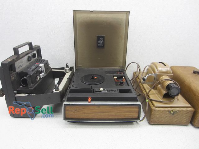 Lot 31-2434 - Vintage Lot: Kodak Instamatic M70 (Power On), Kodak Movie Deck And Vuaid Slide Projector