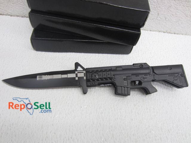 Lot 31-2192 - (3) 4.5" AR-15 Replica Rifle Folding Pocket Knives