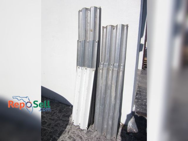 Lot 31-2080 - (15) Aluminum Hurricane/Storm Shutters: (3) 44", (3) 74.5", (1) 42", (3) 41", (2) 65", (3) 58" - 2 S...