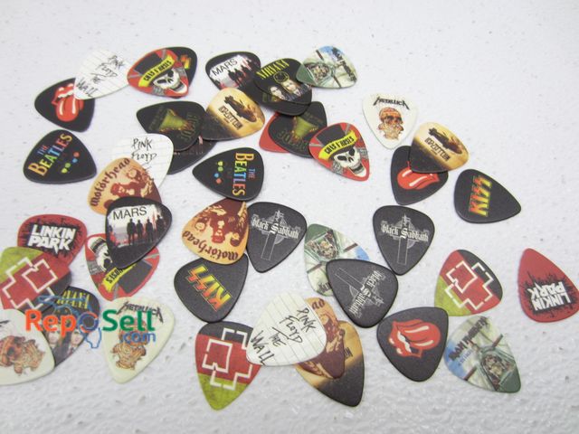 Lot 31-9113 - (43) Guitar Picks: Pink Floyd, Rolling Stones, Guns &amp; Roses, etc.
