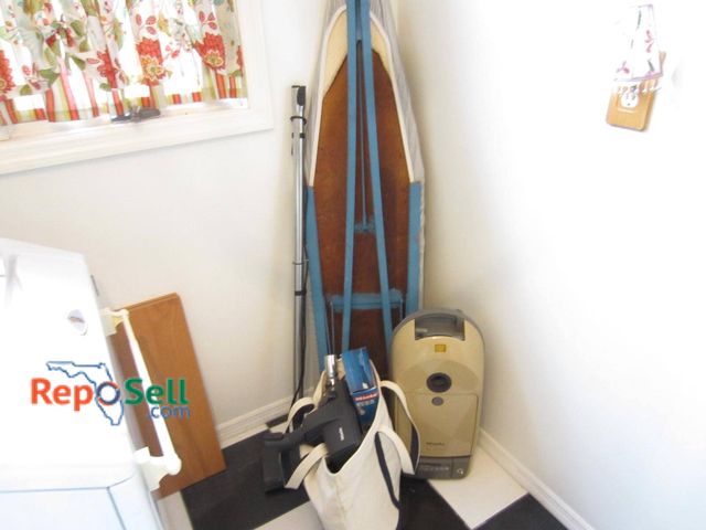 Lot 31-9315 - Includes a Miele vacuum cleaner with associated attachments, a hose, and a box of FJM dust bags. The...