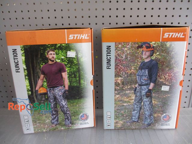 Lot 31-1170 - Two Pairs Of New Stihl Function Apron Chaps In Camo Design. Each Pair Offers Adjustable Features Wit...