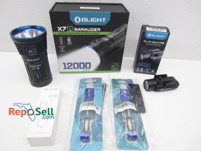 Lot 31-4471 - (2) Olight Flashlights and Accessories: X7 Marauder, PL2 Valkyrie