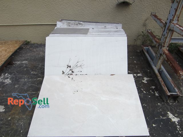 Lot 31-8357 - Approx (43) pcs Floor Tile: Mostly 23.5"x47.5", (1) 23.5"x11.75" And (1) 49"x32"